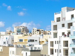 Fototapeta na wymiar bright houses of a town in Malta