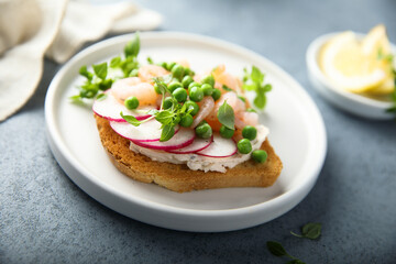 Shrimp toast with cream cheese, radish and green pea