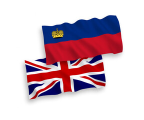 National vector fabric wave flags of Great Britain and Liechtenstein isolated on white background. 1 to 2 proportion.