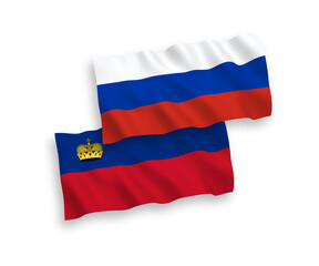 National vector fabric wave flags of Liechtenstein and Russia isolated on white background. 1 to 2 proportion.