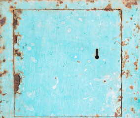 The texture of old blue paint in scratches