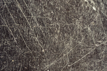 Texture of old black paint covered with scratches