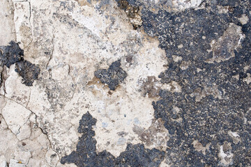 The texture of old concrete. Weather-worn surface