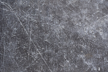 Texture of old black paint covered with scratches