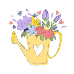 Cute bouquet of flowers with leaves  in a watering can. Beautiful spring flowers in a yellow watering can. Garden concept. Spring concept.