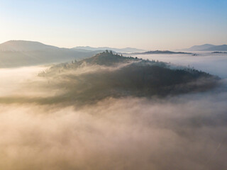Obraz premium Morning fog in the Ukrainian Carpathians. Aerial drone view.