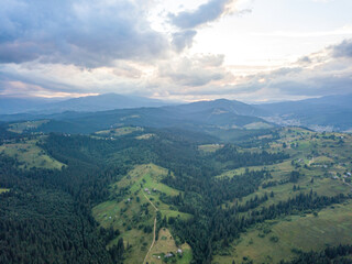 Fototapeta premium Green Ukrainian Carpathians mountains in summer. Aerial drone view.