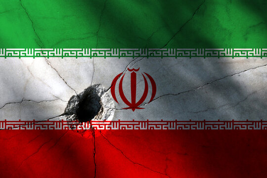 Iran flag with big crack or bullet hole. Military conflict and war in country concept background