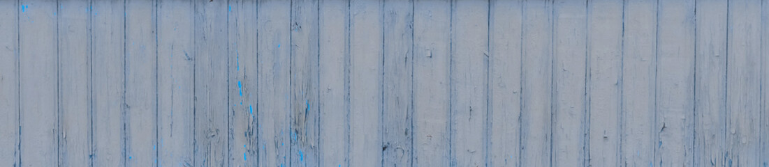 Old wooden worn fence boards weathered texture blue dirty obsolete plank background