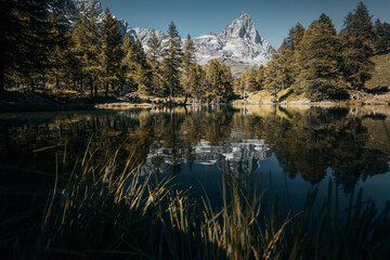 reflection of matterhorn mountain in the lake