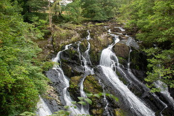 Rhaeadr Ewynnol (Swallow Falls) waterfall, close to the town of Betws-y-Coed. In Snowdonia National Park, north Wales