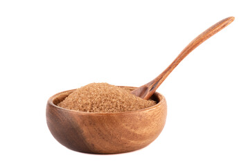 Wooden bowl with cane sugar and a wooden spoon on a white background.