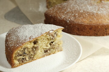 slice of cake with nuts close-up