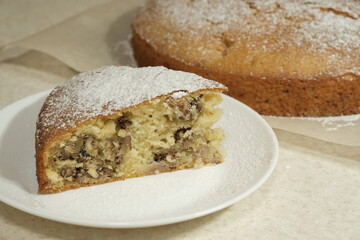 slice of cake with nuts close-up