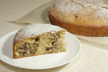 slice of cake with nuts close-up