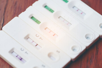 Antigen Test kit with Positive result during swab COVID-19 testing. Coronavirus Self nasal or Home test, Lockdown and Home Isolation concept.