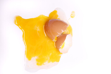 Egg with half open on white background. One egg cracked. with clipping path. top view