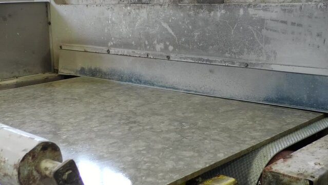 marble is polished. texture of marble polished in a marble factory. industrial granite machines