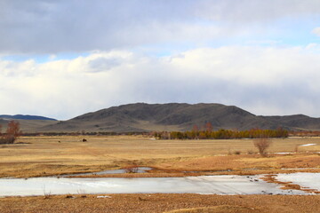 Frozen river landscape in springtime