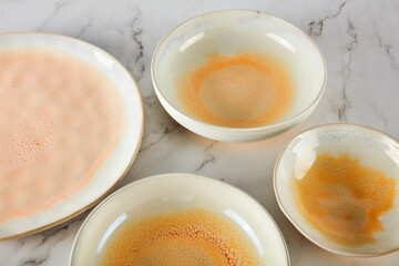 Still life photography of yellow cyan ceramic utensils