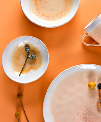 Still life photography of yellow cyan ceramic utensils