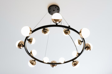 black metal lamp with lamps and light on a white background