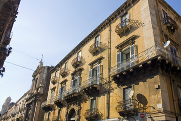 Fototapeta na wymiar Old historical building in Old Town in Catania, Sicily, Italy 