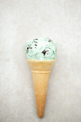 Organic Green Mint Chocolate Chip Ice Cream Scoops in Waffle Cones