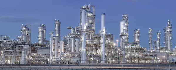 Panoramic view of a chemical factory at night.