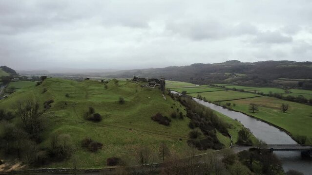 AERIAL: Ascending shot of Dryslwyn Castle and green valley, Carmarthen, 4k Drone