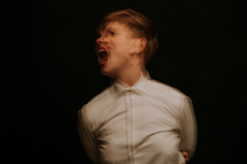 portrait of a psychopathic woman with mental disorders and spiritual diseases on a dark background