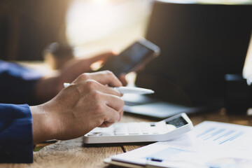 Accounting Financial concept. Businessman accountant or banker making calculations. Business...