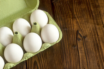 white eggs on a wooden background