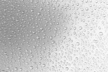 Fototapeta na wymiar Water droplets on gray background covered with water droplets, bubbles in water.