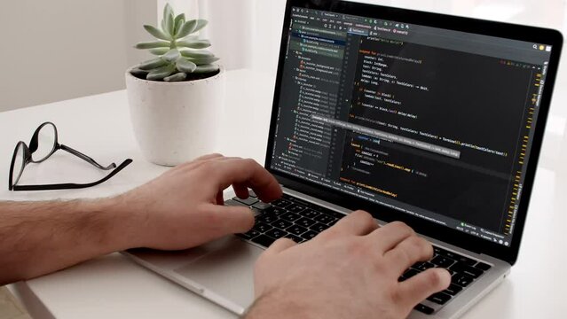Coding on the screen, HTML encoding and programming on a laptop screen, developer, web development. Computer Web Developer. Cloud data social network media or virus. High quality 4k footage