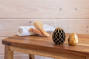 Easter spa. Rolled towels in spa salon. Golden and black eggs of geometric style. Happy Easter greeting card. Holiday concept in minimal style. High quality photo