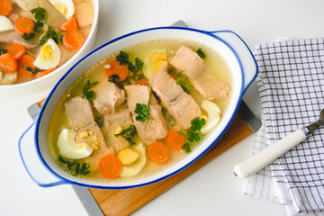 Trout fish in aspic with vegetables. Fish in jelly. Fish with gelatin