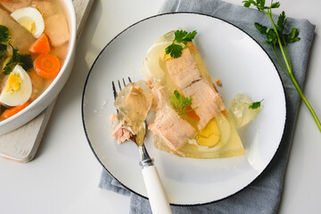 Trout fish in aspic with vegetables. Fish in jelly. Fish with gelatin