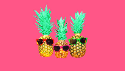 Pineapple with pink sunglasses on pink background, colorful ananas
