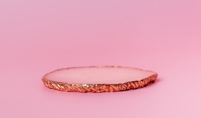 Product pedestal on pink background. Podium in minimalistic style. Showcase for goods. High quality photo