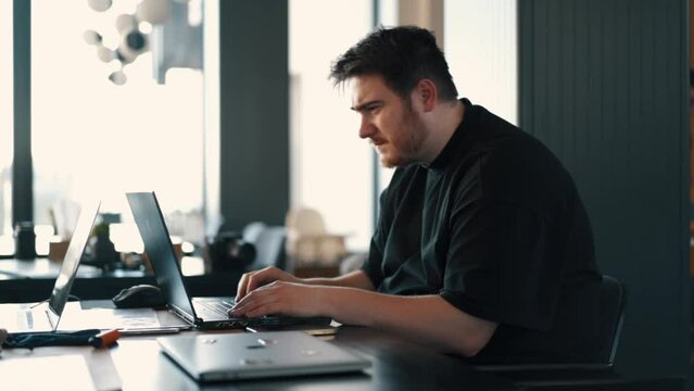 A fat IT guy writes a program, codes a mobile application, possibly a hacker