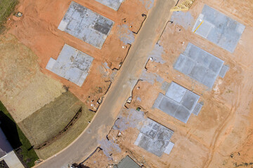 Construction laying the concrete foundation of an apartment house