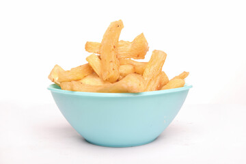 front view of fried cassava in a blue bowl on a white background, copy space, texture, Indonesian food. clipping path