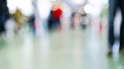 Large group of people walking in exhibition hall