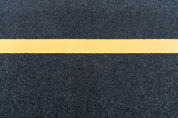 Asphalt road with yellow line