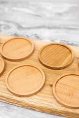 Natural Wooden coasters on the board