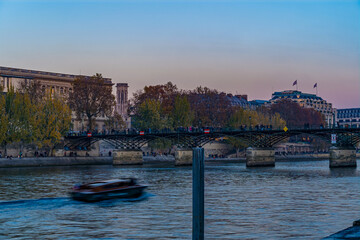 Seine River Bridge and Docks at the End of Day in Paris Tourists Enjoying the Moment