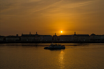 Fototapeta na wymiar Bordeaux at Sunset With Boats and Famous Bourse Place
