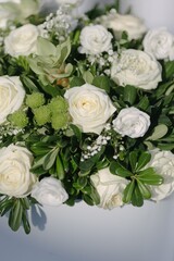 Fototapeta na wymiar Wedding floral arrangement with white roses.
