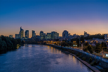 Blue and Purple Sky Over La Defense District at Twilight With Seine River and Towers